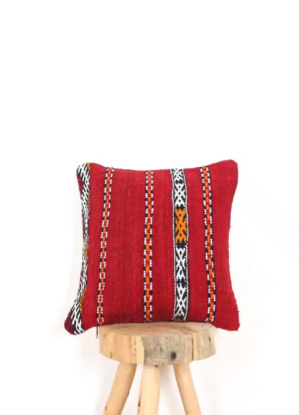 Moroccan cowhide pillows with intricate patterns and vibrant colors