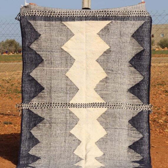 Moroccan Woven Kilim Rug with intricate geometric patterns and handwoven details