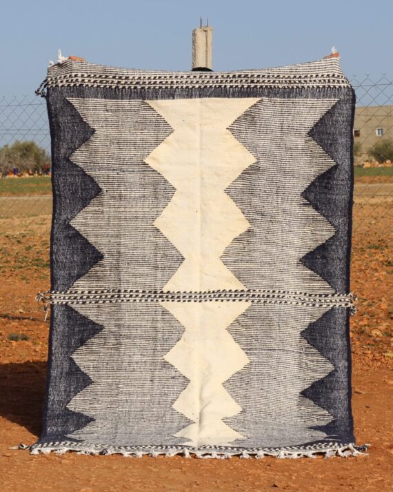 Moroccan Woven Kilim Rug with intricate geometric patterns and handwoven details