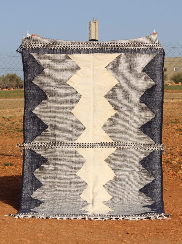 Moroccan Woven Kilim Rug with intricate geometric patterns and handwoven details