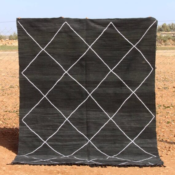 Handmade Black Striped Rug with sleek contrasting stripes and soft wool texture