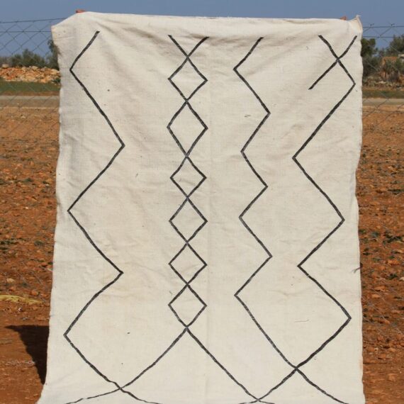 Minimalist White Beni Ourain Rug with subtle geometric patterns and handwoven craftsmanship