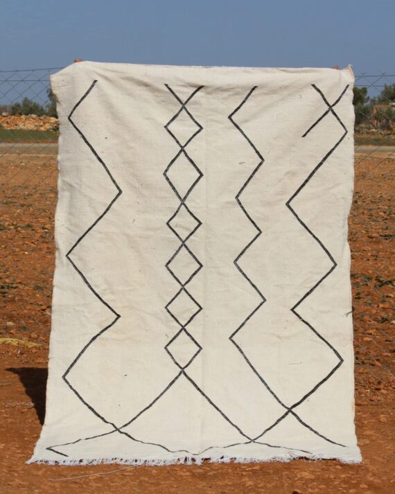 Minimalist White Beni Ourain Rug with subtle geometric patterns and handwoven craftsmanship