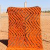 Handwoven Moroccan Rug Orange with bold abstract patterns for living room décor