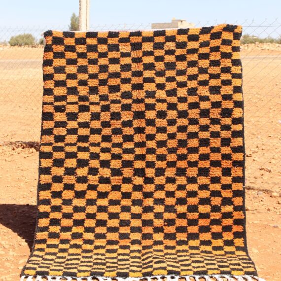 Handwoven Moroccan Colorful Rug in black and orange with intricate patterns