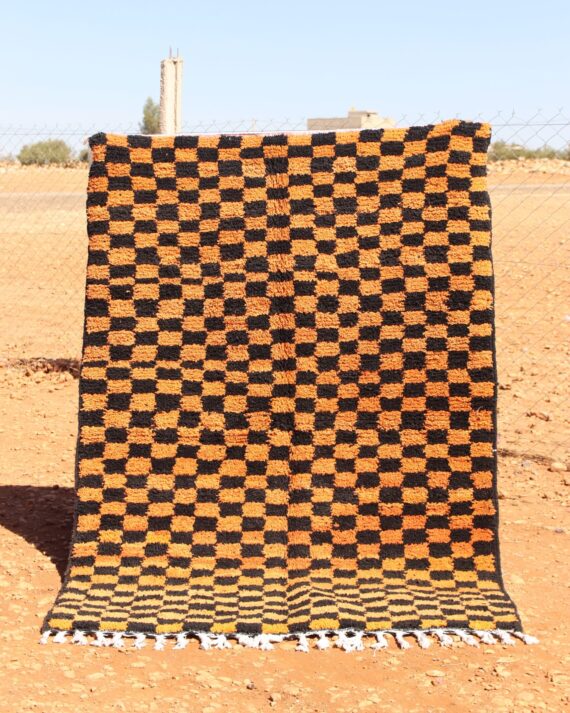 Handwoven Moroccan Colorful Rug in black and orange with intricate patterns