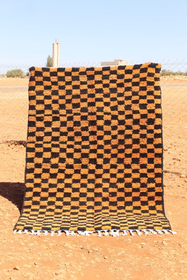 Handwoven Moroccan Colorful Rug in black and orange with intricate patterns