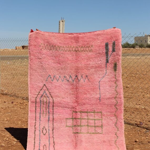 Pink Abstract Rug with vibrant pink tones and unique patterns