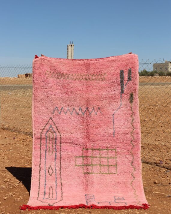 Pink Abstract Rug with vibrant pink tones and unique patterns