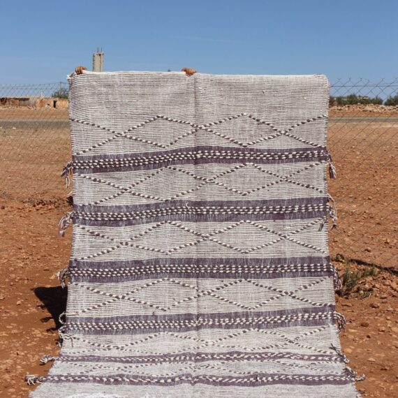 Handmade Berber Striped Rug with vibrant stripes and natural fibers