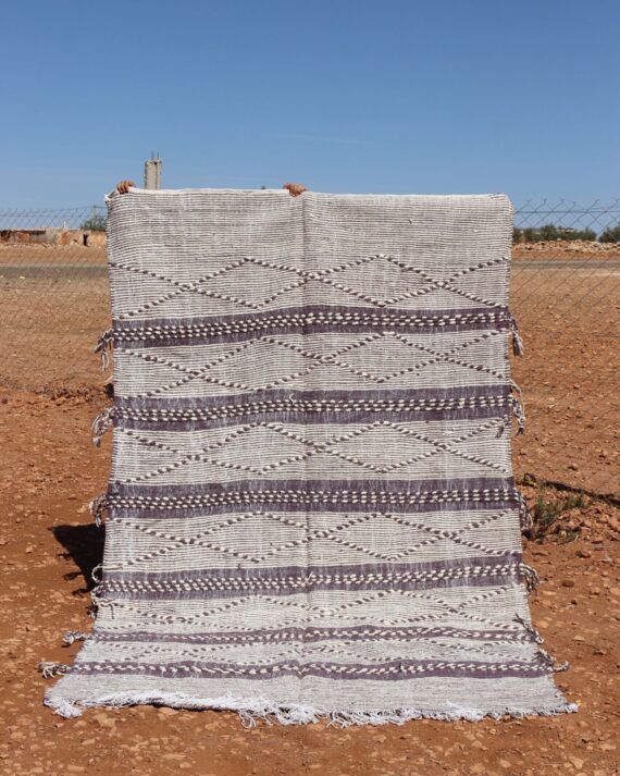 Handmade Berber Striped Rug with vibrant stripes and natural fibers