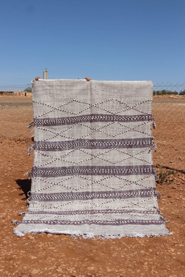 Handmade Berber Striped Rug with vibrant stripes and natural fibers