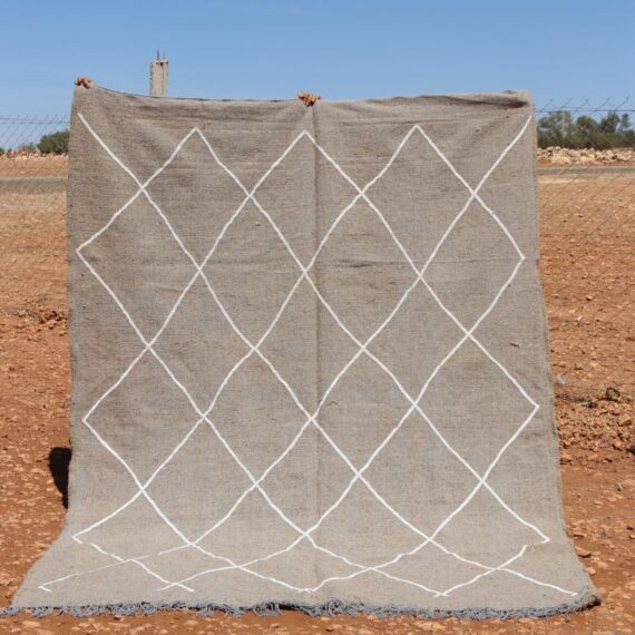 Moroccan Kilim Berber Rug with traditional patterns and earthy tones