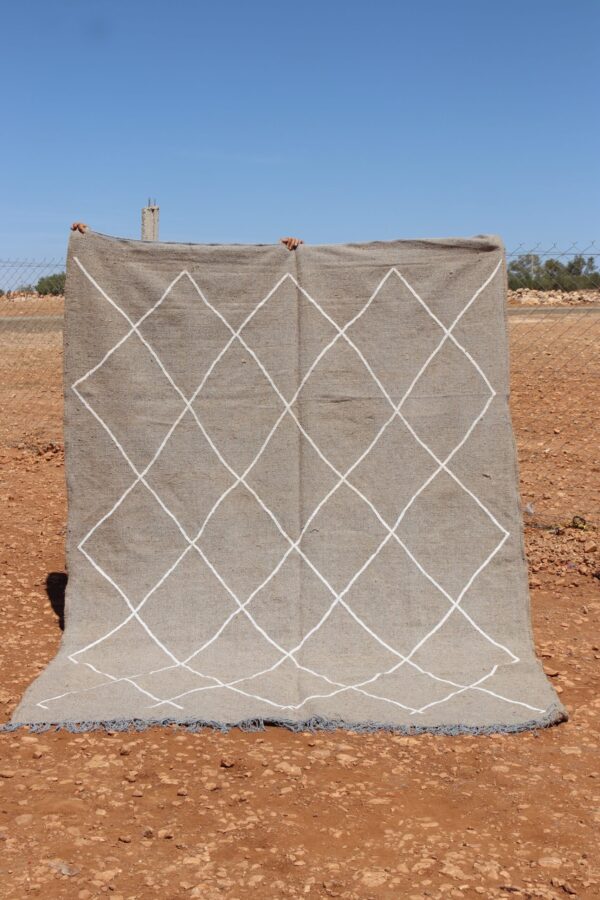 Moroccan Kilim Berber Rug with traditional patterns and earthy tones