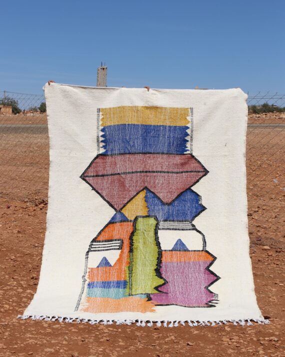 Minimalist Colorful Kilim Rug with subtle and vibrant patterns and handwoven craftsmanship