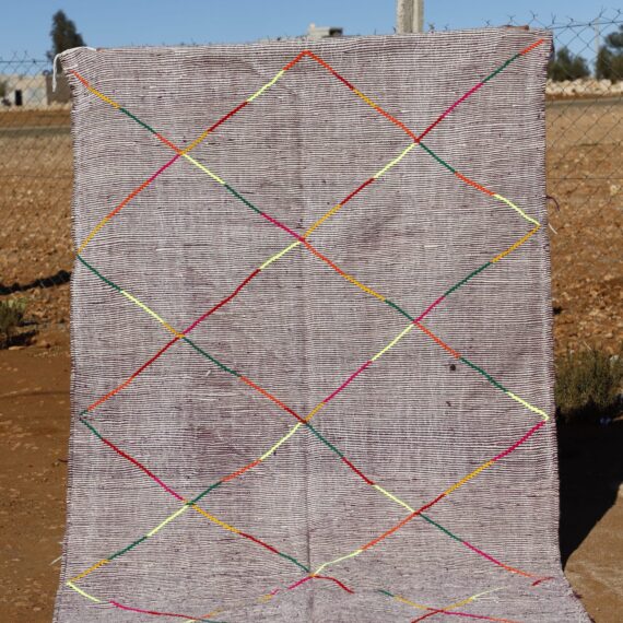 Artisanal Flatweave Rug with intricate designs and vibrant colors