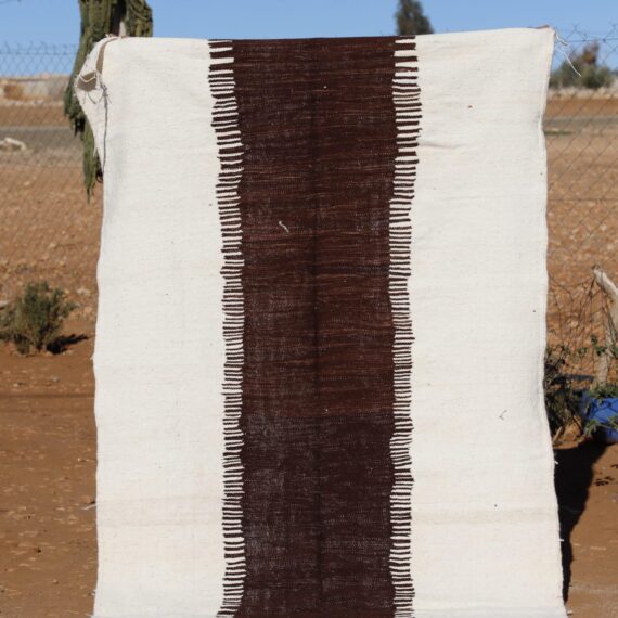 Minimalist Bohemian Rug with subtle patterns and natural colors