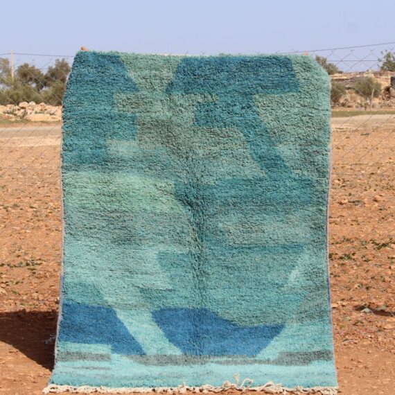 Handwoven abstract rug in blue tones