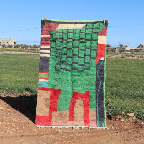 Handwoven Moroccan green Berber rug with geometric design