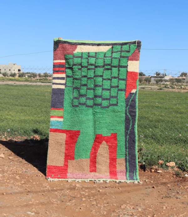 Handwoven Moroccan green Berber rug with geometric design