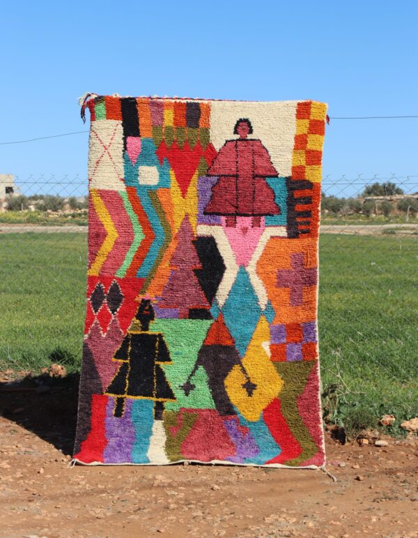 Handwoven Moroccan abstract rug with vibrant geometric patterns