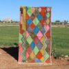Handwoven Moroccan abstract rug with colorful diamond pattern