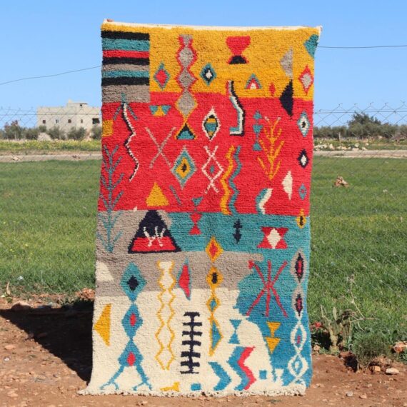 Handwoven Moroccan Berber rug with traditional geometric patterns