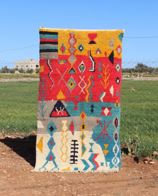 Handwoven Moroccan Berber rug with traditional geometric patterns