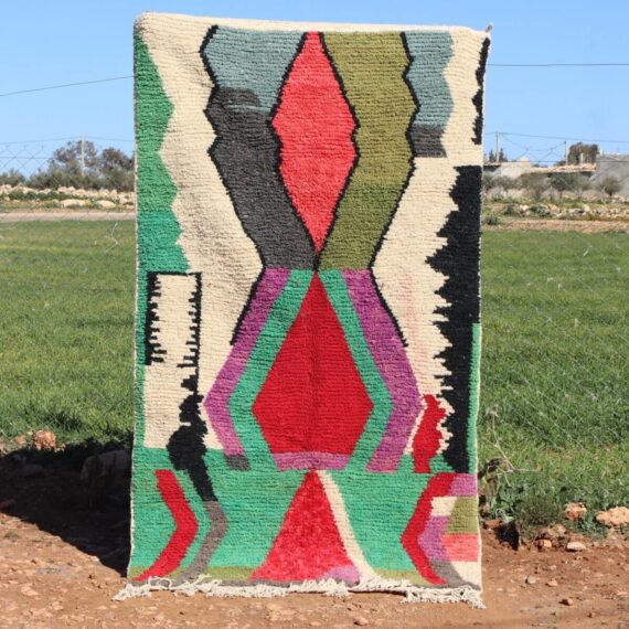 Handwoven Moroccan Berber carpet with bold geometric design
