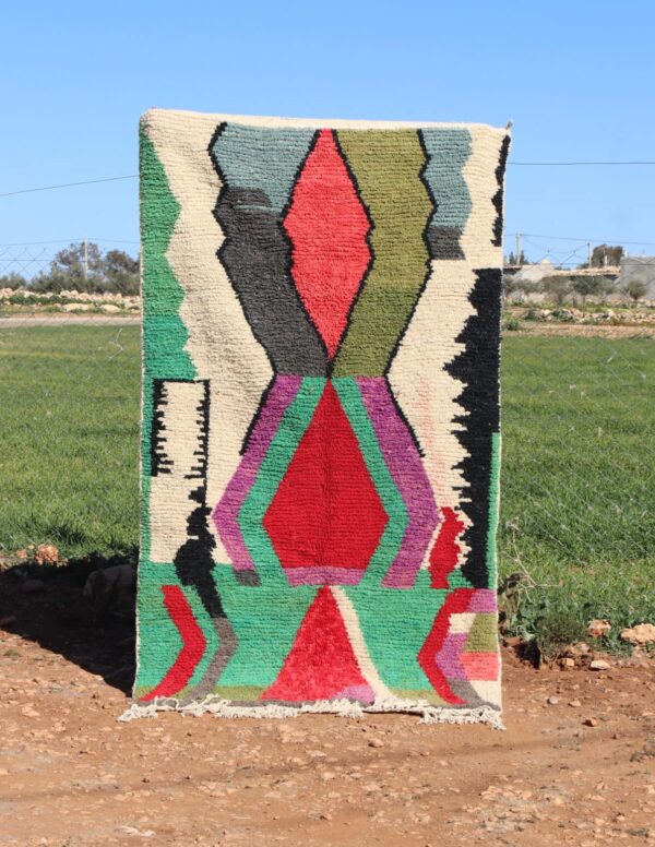 Handwoven Moroccan Berber carpet with bold geometric design