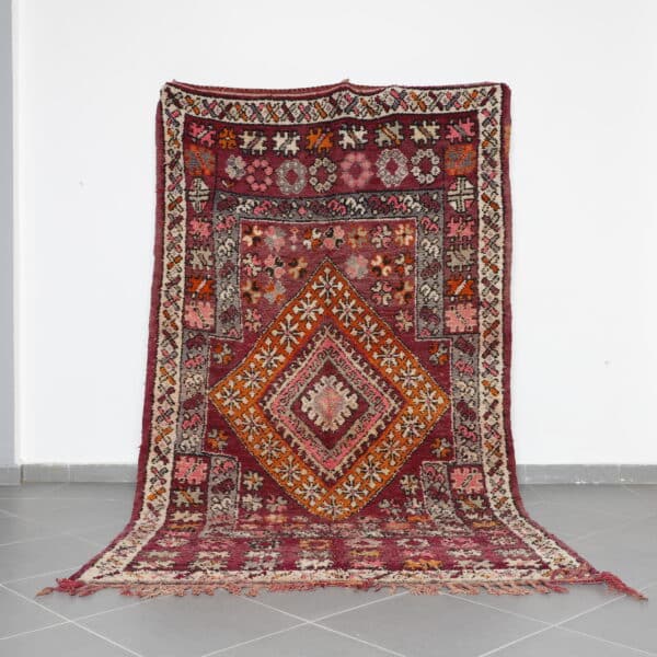 Old Boujaad Rug 10.5x5.9 Ft handcrafted in Morocco with Amazigh tribal motifs