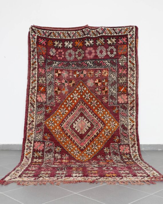 Old Boujaad Rug 10.5x5.9 Ft handcrafted in Morocco with Amazigh tribal motifs