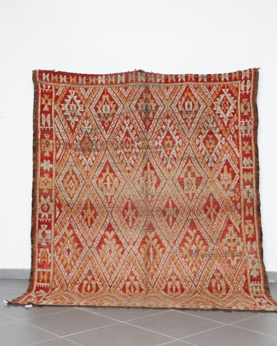 Vintage Beni Mguild 8.3x6.9 Ft handknotted in Morocco with Amazigh motifs