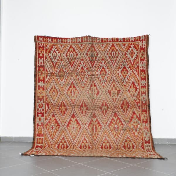 Vintage Beni Mguild 8.3x6.9 Ft handknotted in Morocco with Amazigh motifs