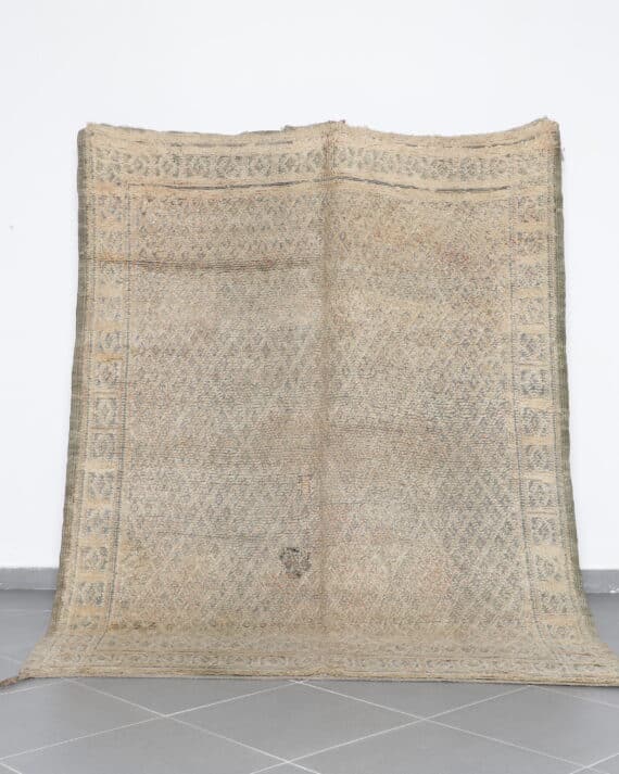 Vintage Beni Mguild 9.0x8.2 Ft handknotted in Morocco with tribal Amazigh motifs