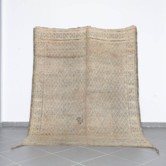 Vintage Beni Mguild 9.0x8.2 Ft handknotted in Morocco with tribal Amazigh motifs