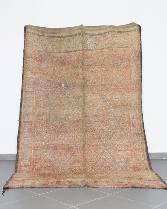 Vintage Beni Mguild 9.5x6.1 Ft handknotted in Morocco with tribal Amazigh motifs