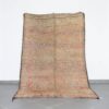 Vintage Beni Mguild 9.5x6.1 Ft handknotted in Morocco with tribal Amazigh motifs