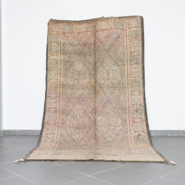 Vintage Beni Mguild 9.8x5.7 Ft handknotted in Morocco with Amazigh motifs