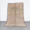 Vintage Beni Mguild 9.8x5.7 Ft handknotted in Morocco with Amazigh motifs