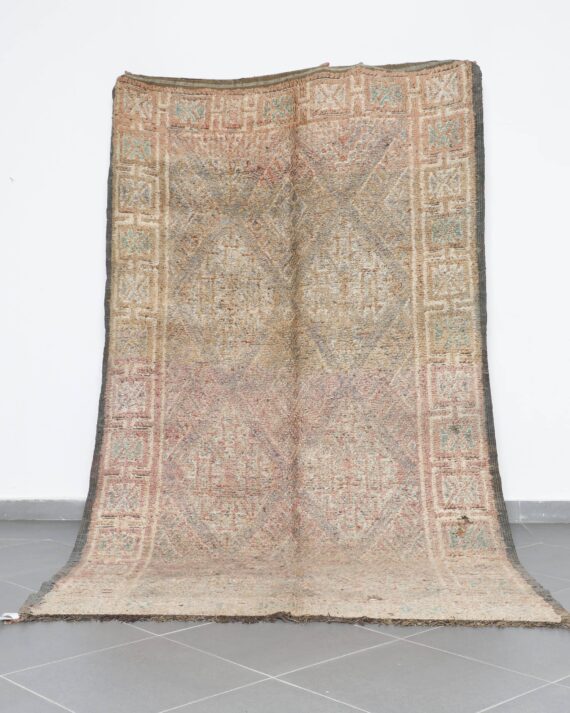 Vintage Beni Mguild 9.8x5.7 Ft handknotted in Morocco with Amazigh motifs