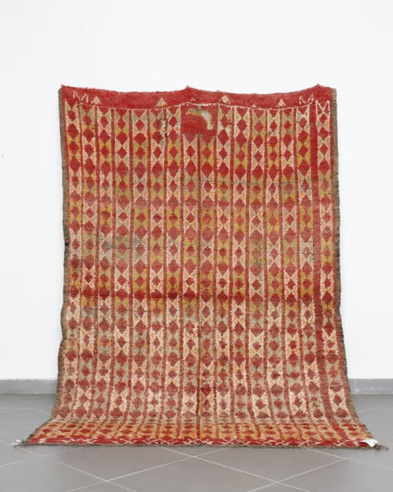 Vintage Beni Mguild 8.5x5.6 Ft handknotted in Morocco with Amazigh motifs