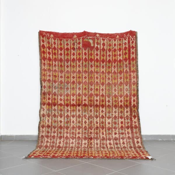 Vintage Beni Mguild 8.5x5.6 Ft handknotted in Morocco with Amazigh motifs