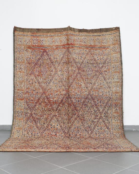 Vintage Beni Mguild 9.4x6.6 Ft handknotted in Morocco with Amazigh motifs