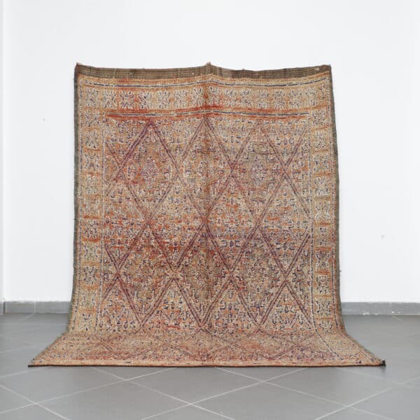 Vintage Beni Mguild 9.4x6.6 Ft handknotted in Morocco with Amazigh motifs