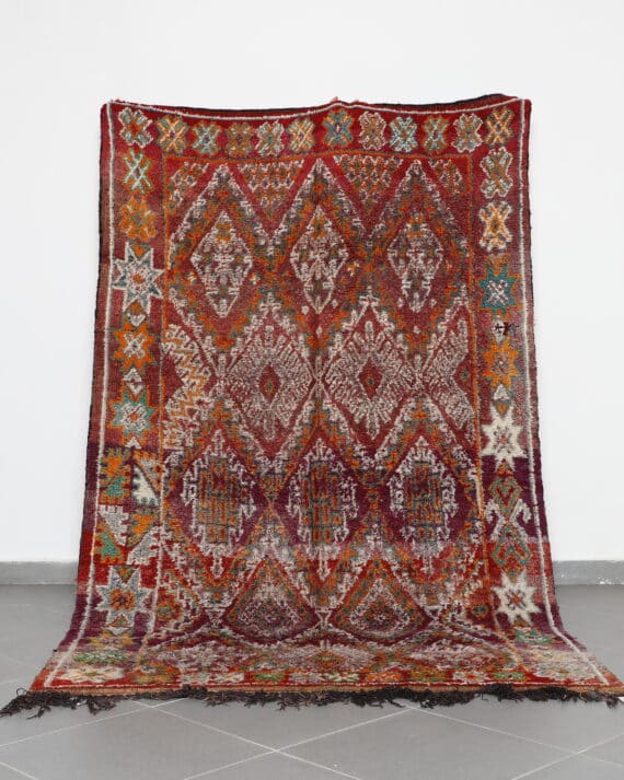 Vintage Zayan 9.5x5.7 Ft handknotted in Morocco with tribal Amazigh motifs