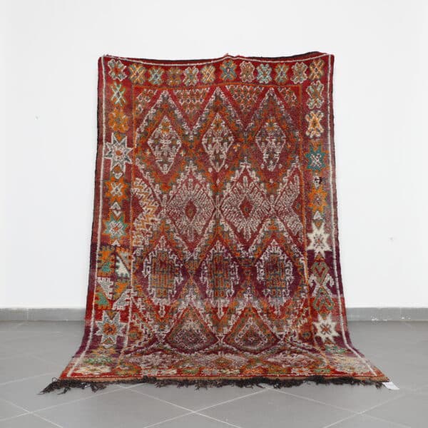 Vintage Zayan 9.5x5.7 Ft handknotted in Morocco with tribal Amazigh motifs