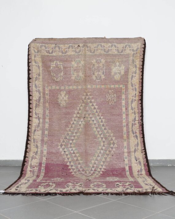 Vintage Oulad Bousbaa Rug 5.8x9.8 Ft handknotted in Morocco with tribal motifs