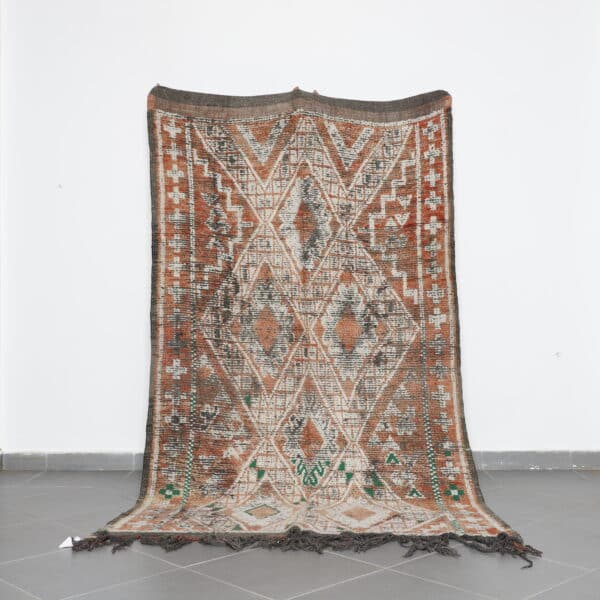 Vintage Zayan Rug 8.9x5.6 Ft handknotted in Morocco with tribal motifs