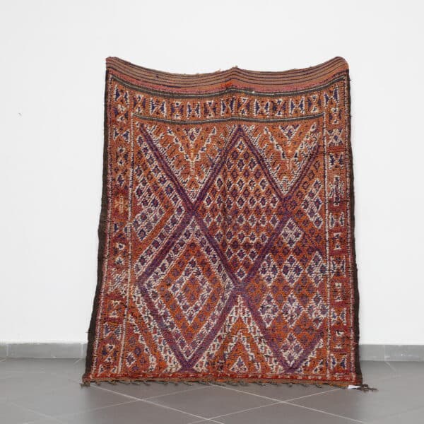 Vintage Zayan Rug 6.9x4.5 Ft handknotted in Morocco with Berber tribal motifs